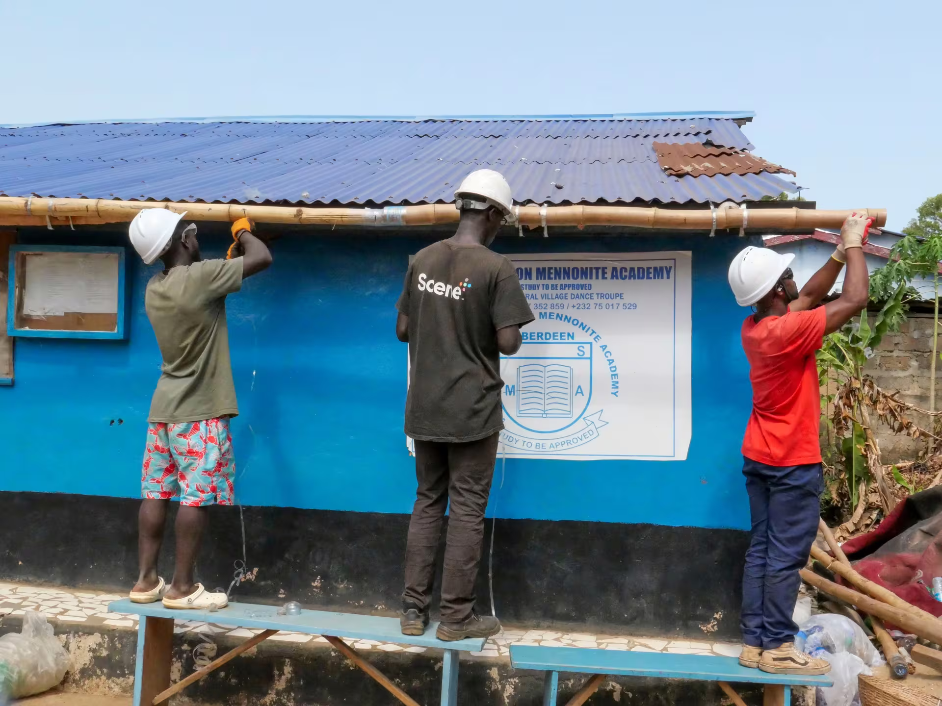 Installing bamboo supports at the Mennonite Academy