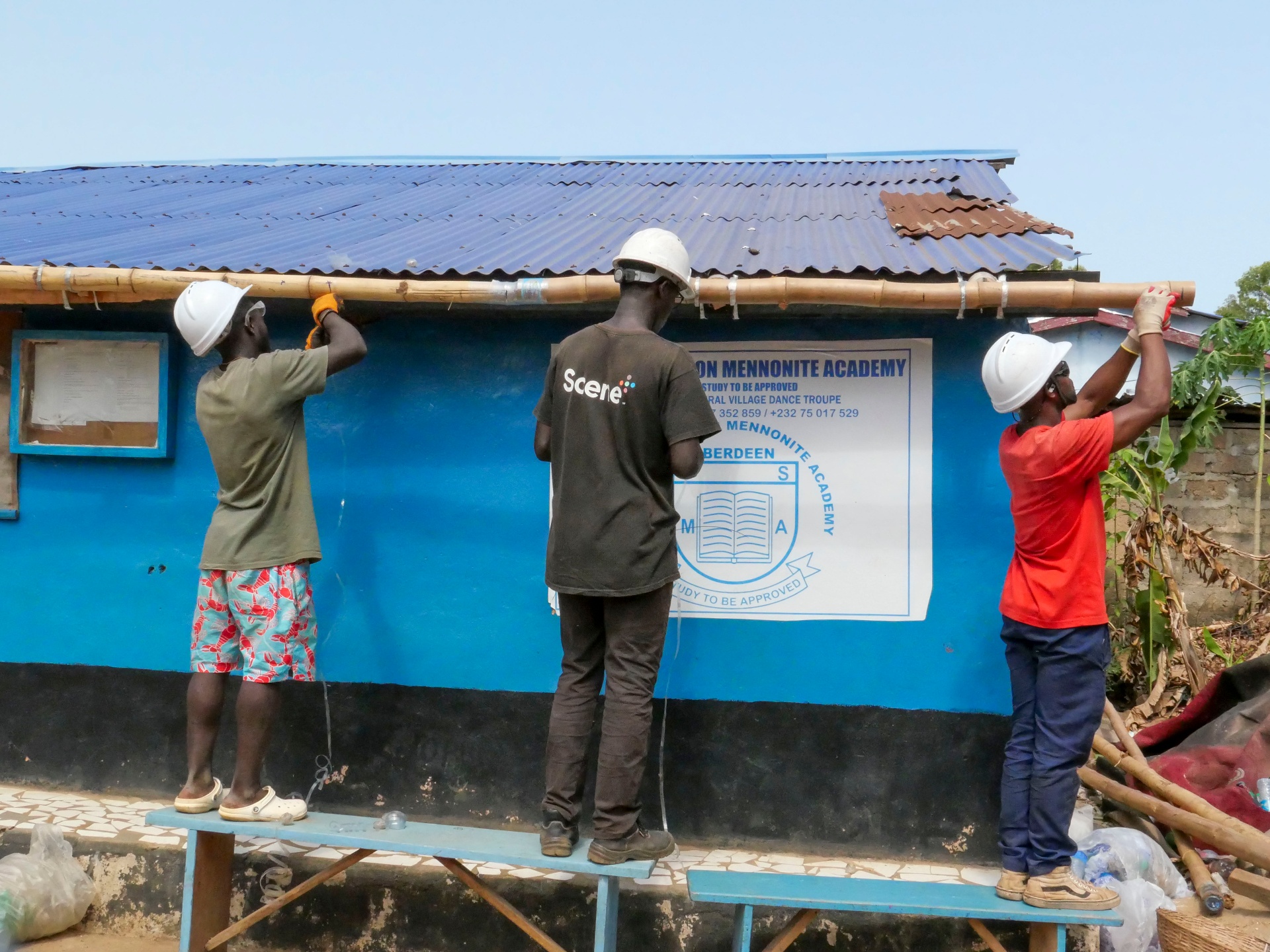 Installing bamboo supports at the Mennonite Academy