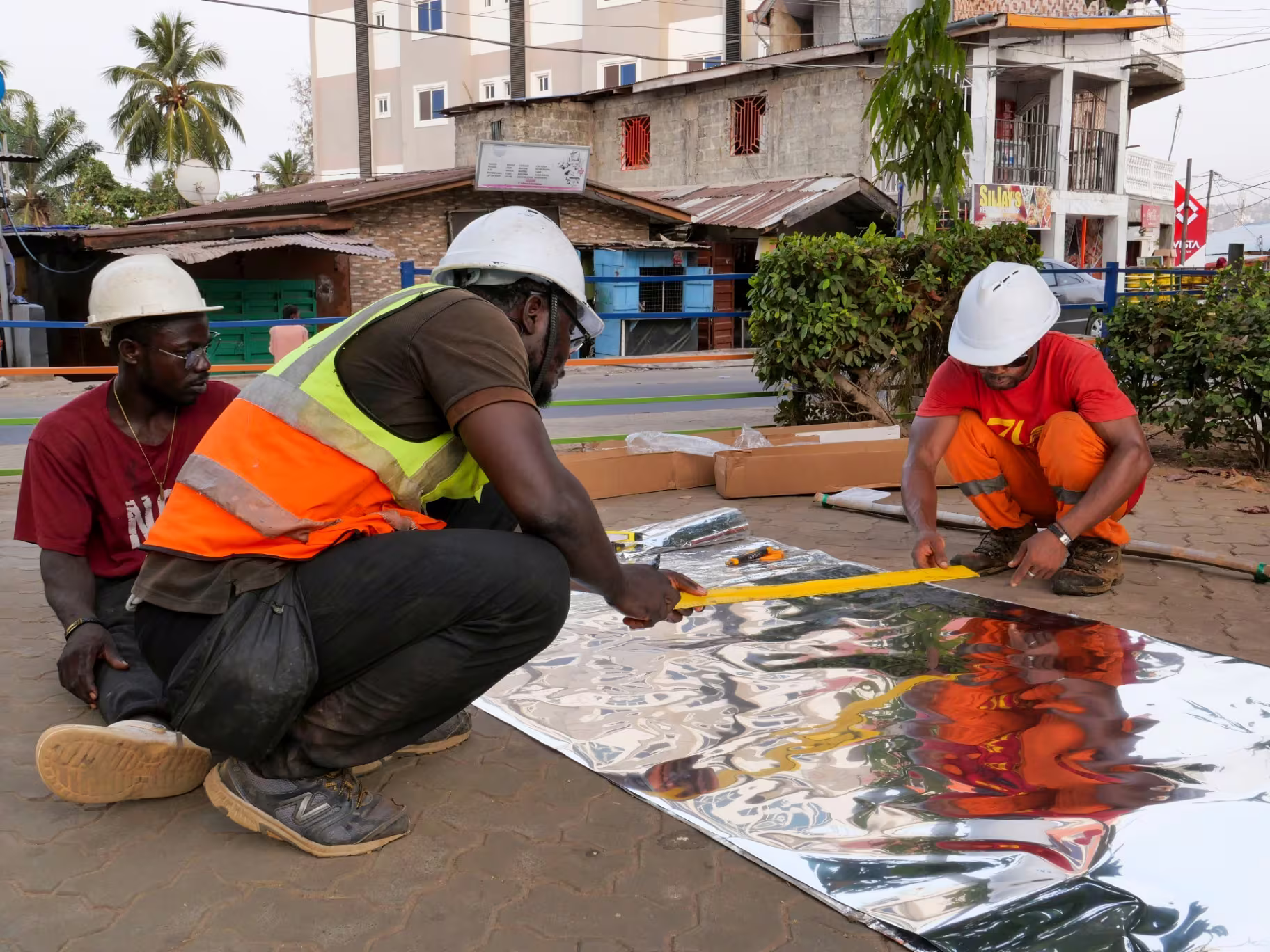 Measuring and cutting reflective sheeting on the street