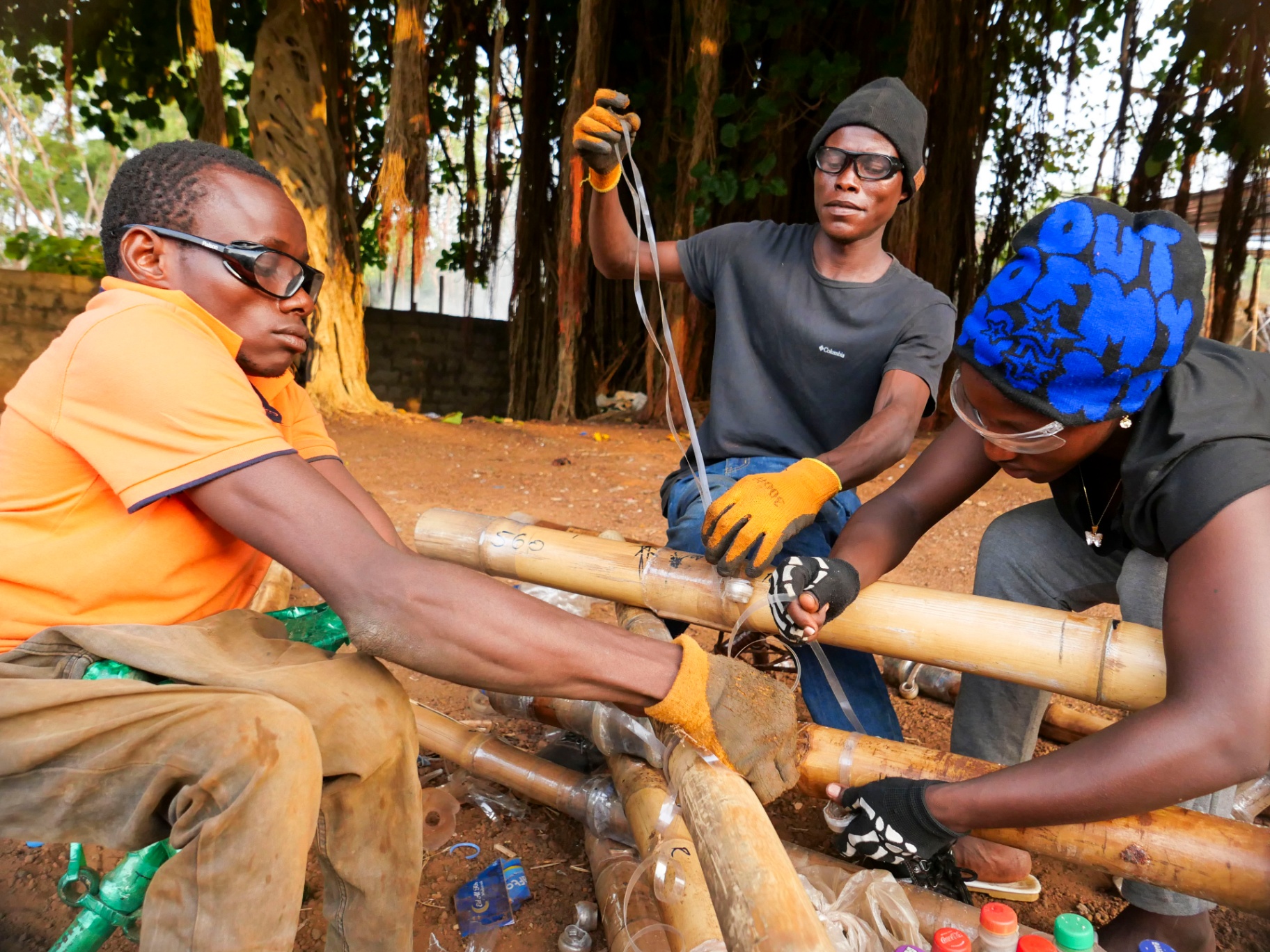 Local team assembling a bamboo canopy frame