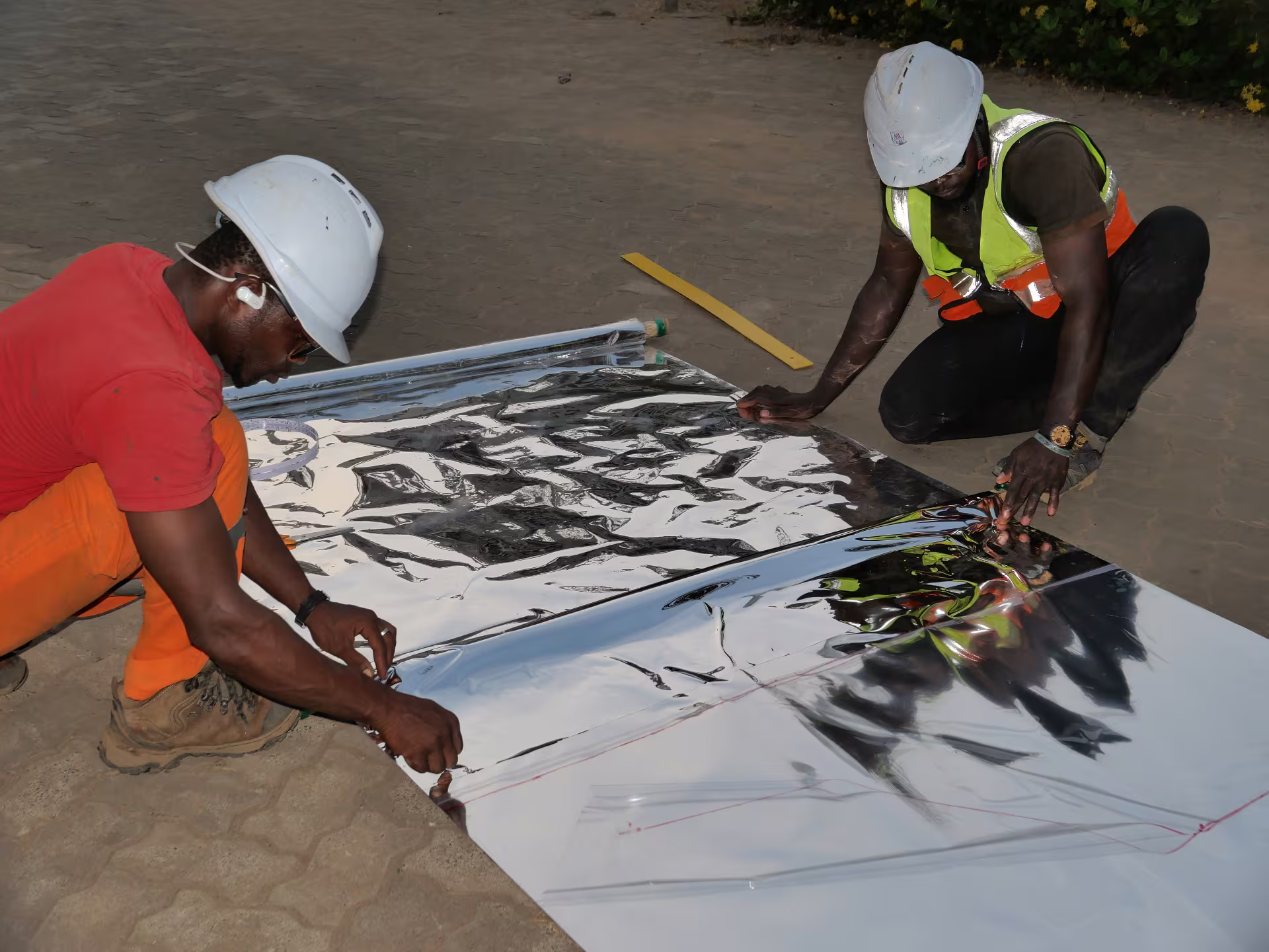 Preparing reflective aluminum sheeting on site